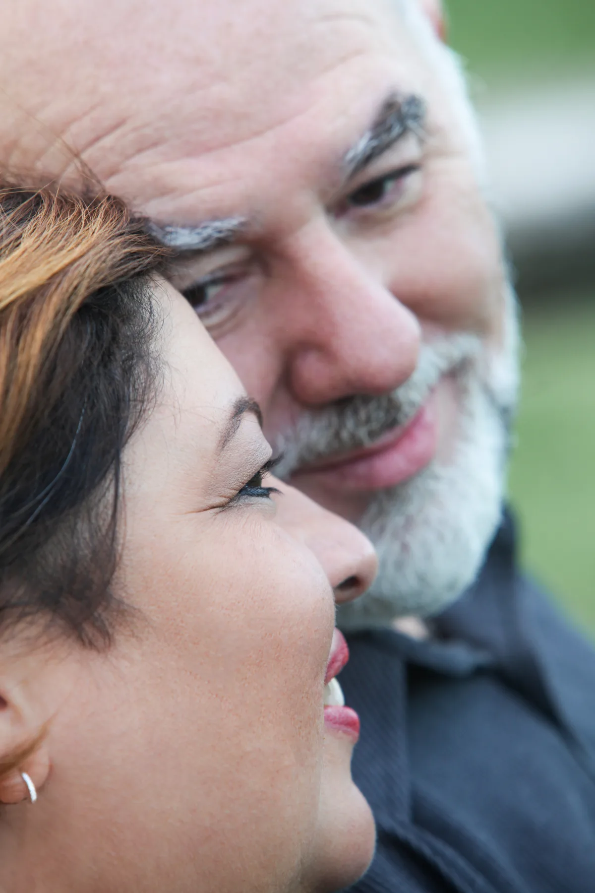 A couple sharing a tender, intimate moment outdoors – rebuilding connection through Imago Couples Therapy